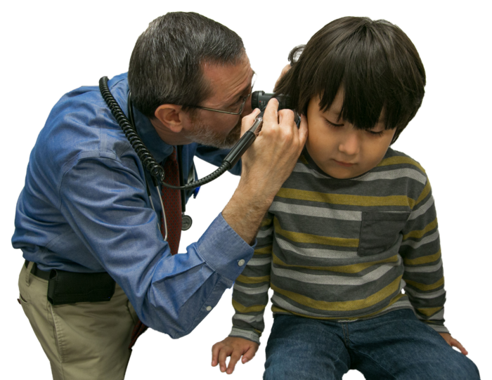 doctor examining child's ear